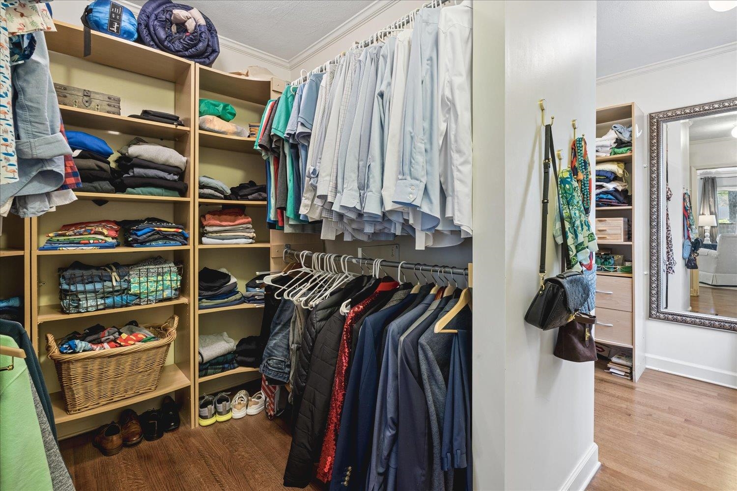 5311 South Angela Road Memphis, TN 38120 - Photo 26 of 40 a view of walk in closet with clothes and shoes