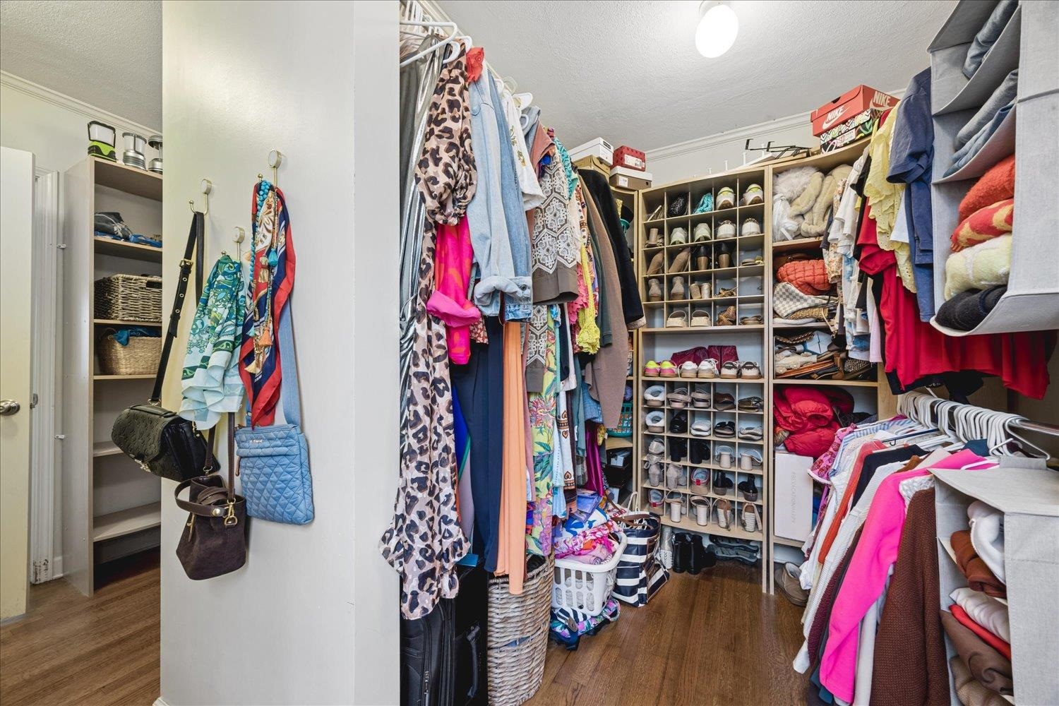 5311 South Angela Road Memphis, TN 38120 - Photo 27 of 40 a view of walk in closet with clothes