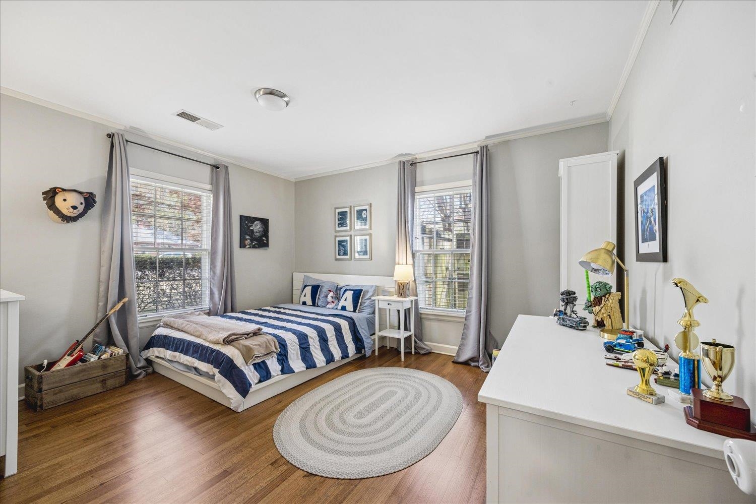5311 South Angela Road Memphis, TN 38120 - Photo 28 of 40 a bedroom with two beds and a dresser