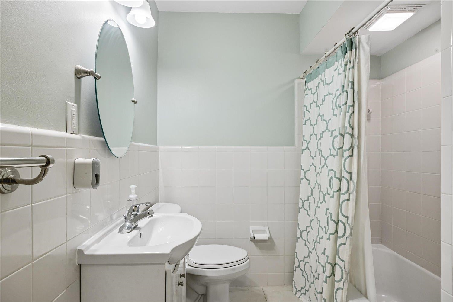 5311 South Angela Road Memphis, TN 38120 - Photo 29 of 40 a bathroom with a sink toilet and shower
