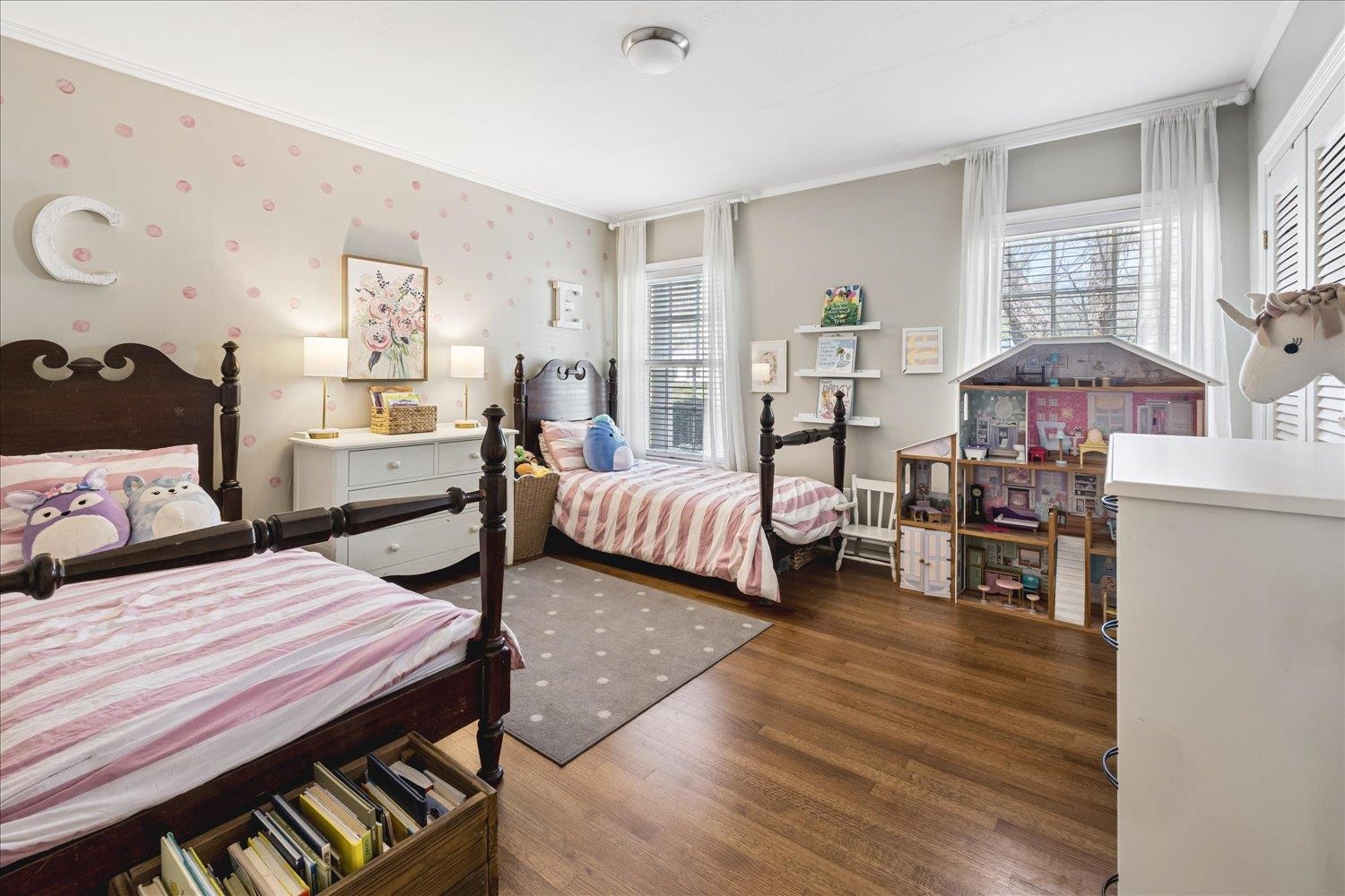 5311 South Angela Road Memphis, TN 38120 - Photo 30 of 40 a bedroom with furniture and a wooden floor