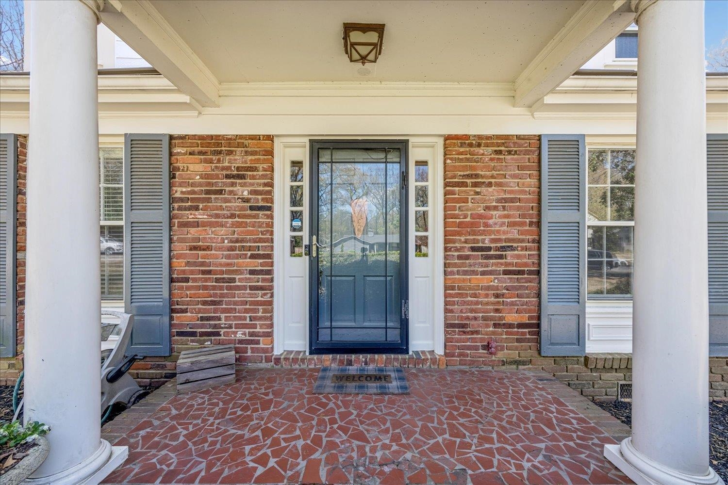 5311 South Angela Road Memphis, TN 38120 - Photo 5 of 40 a front view of a house with a door