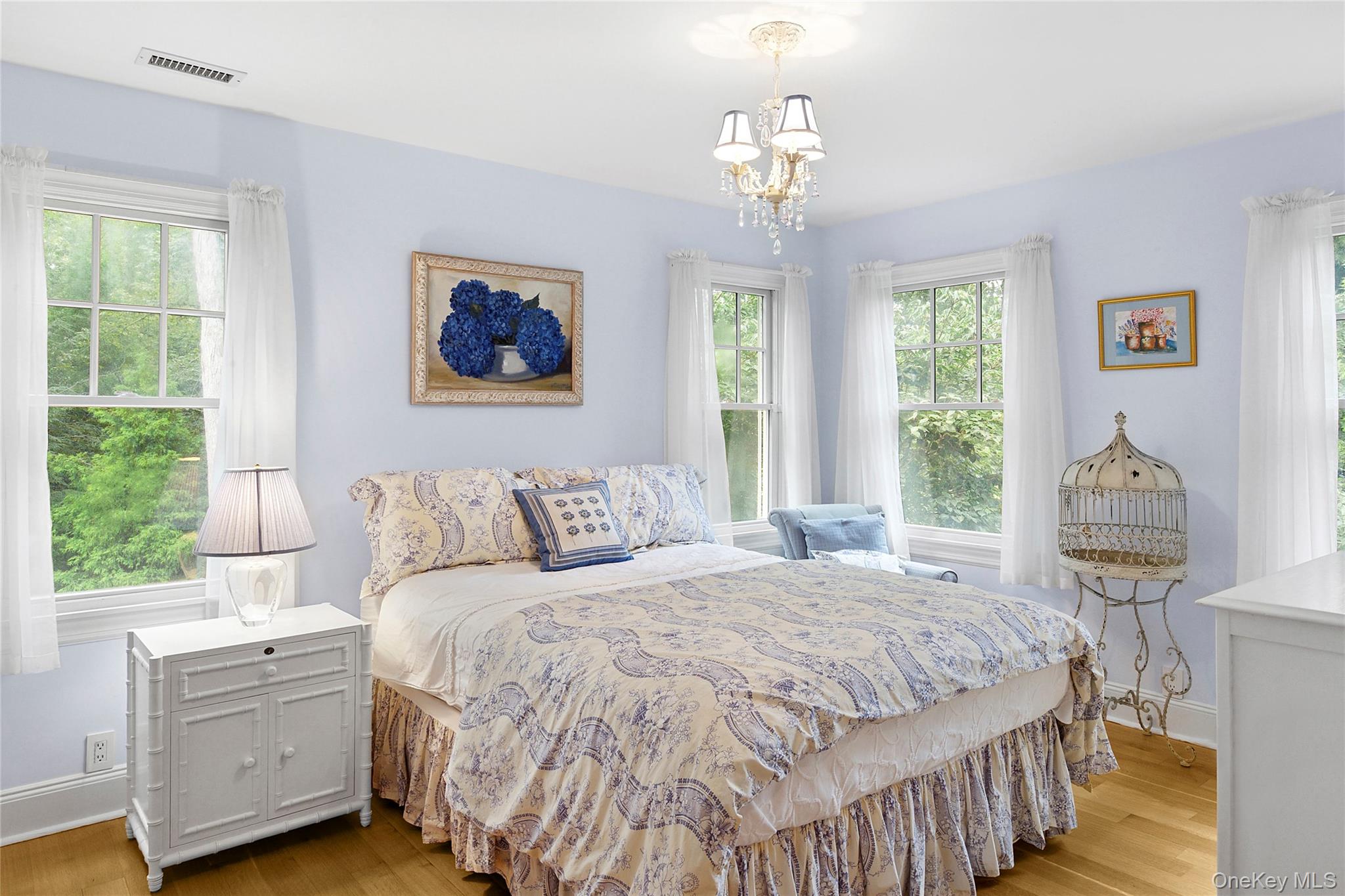 55 Cedar Lane West Remsenburg, NY 11960 - Photo 16 of 27 a bedroom with a large bed and a window