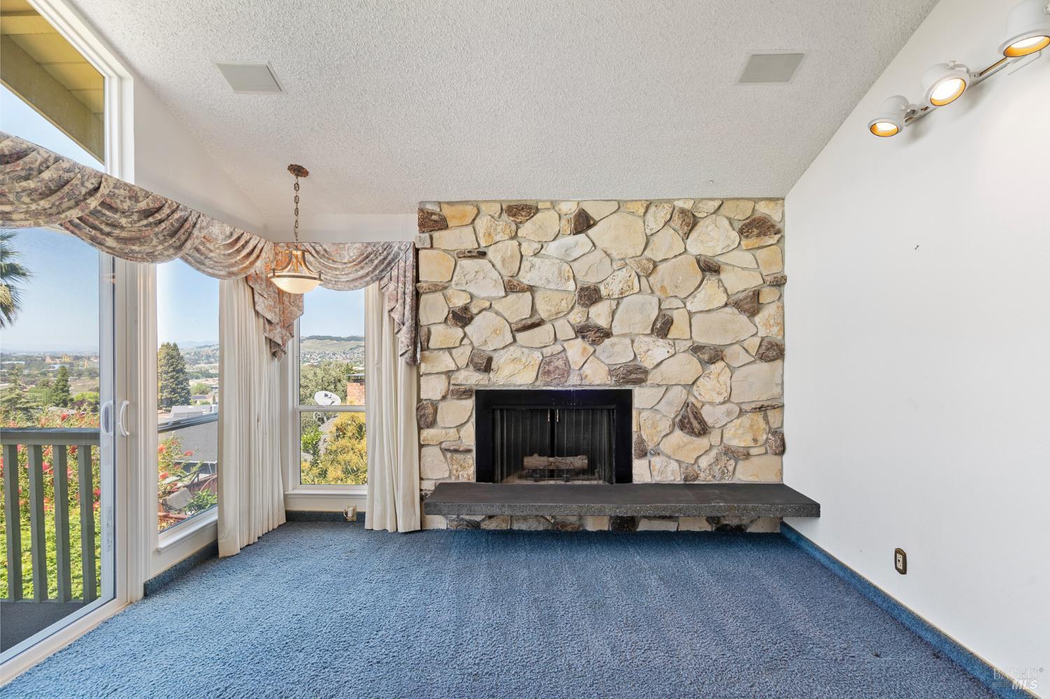 116 Silverview Court Vallejo, CA 94591 - Photo 26 of 61 Huge loft with views, balcony and hand picked stone fireplace.