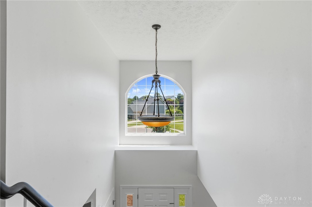 70 Martin Lane Springboro, OH 45066 - Photo 28 of 69 This spacious entry boasts high ceilings and an elegant arched window.
