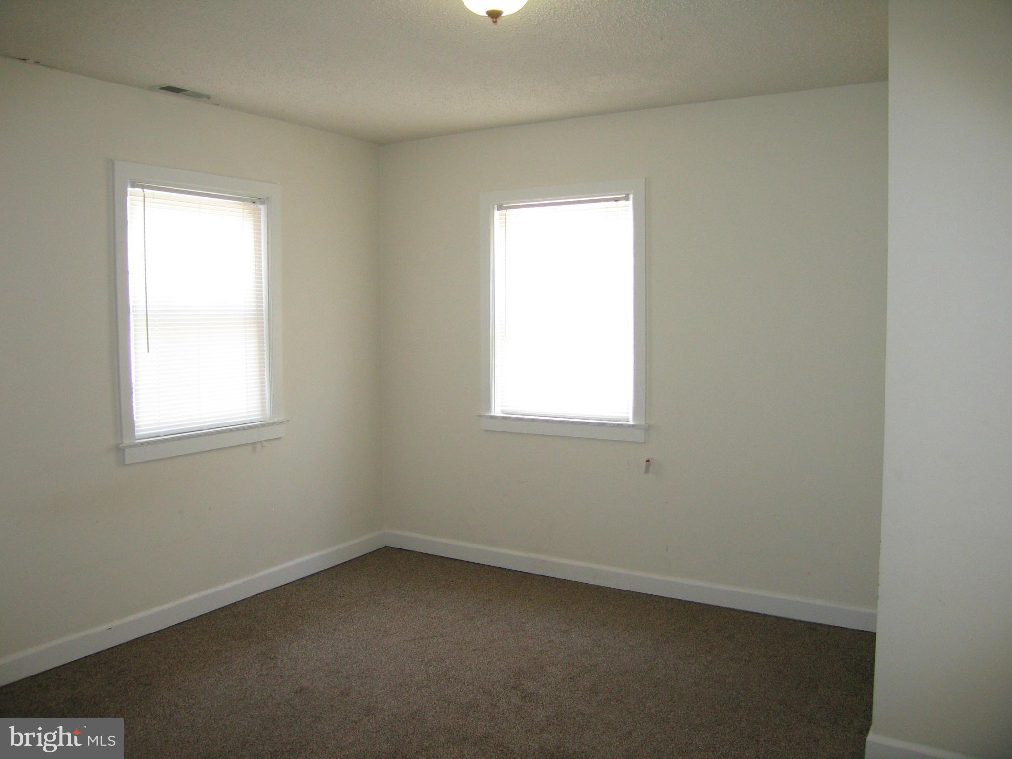 408 C Street, Unit 202 Quantico, VA 22134 - Photo 2 of 23 an empty room with a window