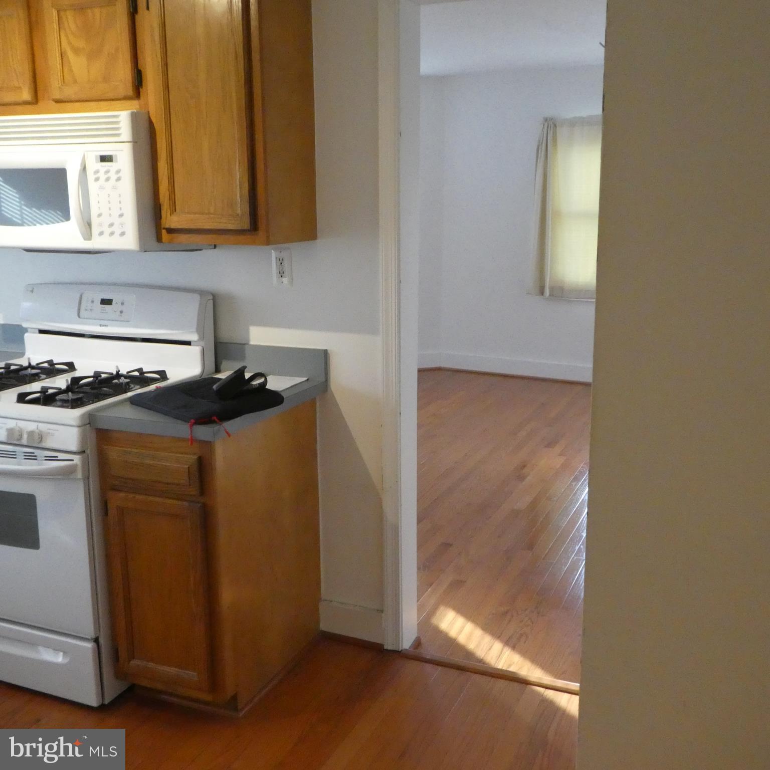 408 C Street, Unit 202 Quantico, VA 22134 - Photo 21 of 23 a kitchen with a stove and a cabinet