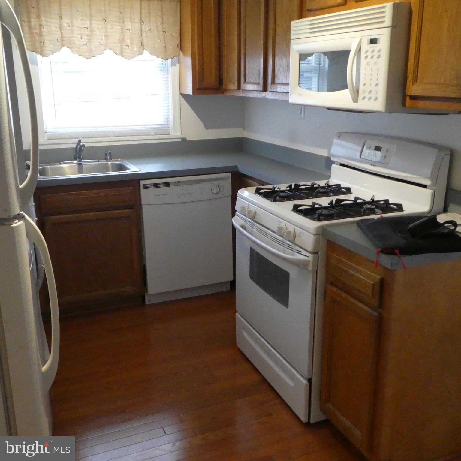 408 C Street, Unit 202 Quantico, VA 22134 - Photo 23 of 23 a kitchen with a stove and a sink