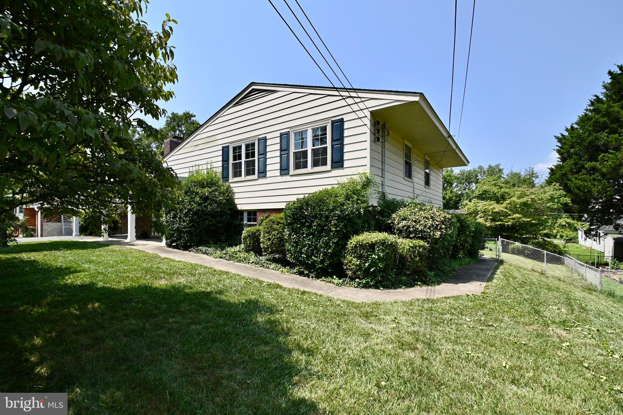 5010 Ravensworth Road Annandale, VA 22003 - Photo 39 of 42 Wrap around side walk to downstairs suite