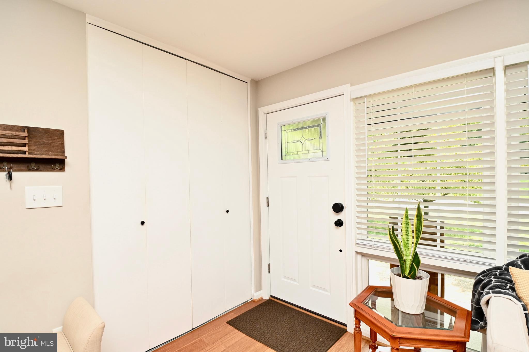 5010 Ravensworth Road Annandale, VA 22003 - Photo 42 of 42 Front entry with large coat/storage closet