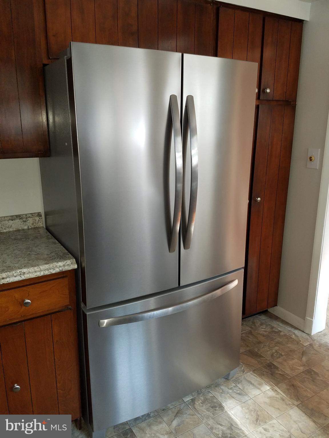 3612 Edgewood Road Randallstown, MD 21133 - Photo 19 of 36 New Stainless Steel Refrigerator