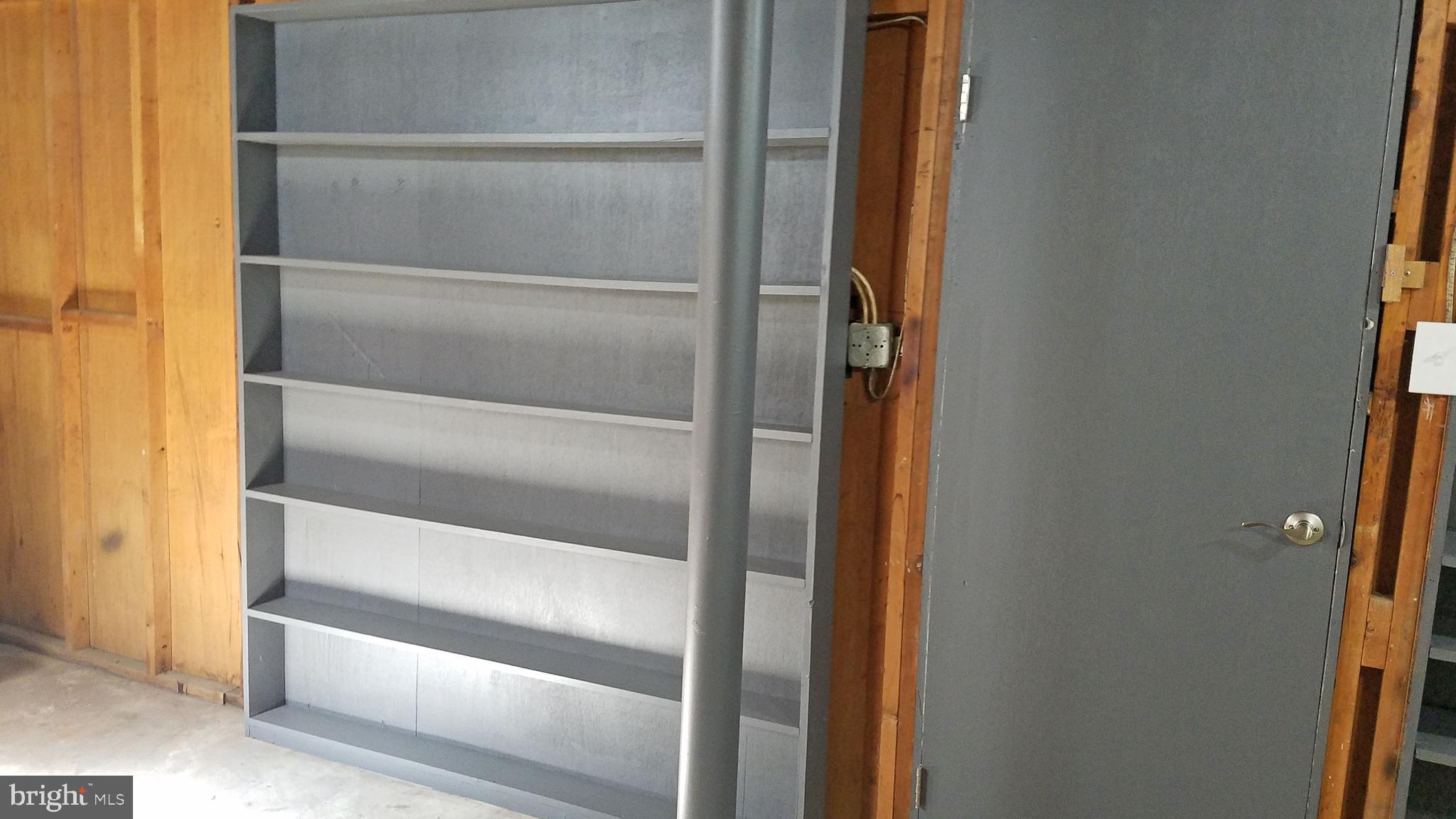 3612 Edgewood Road Randallstown, MD 21133 - Photo 34 of 36 Basement Storage Shelving