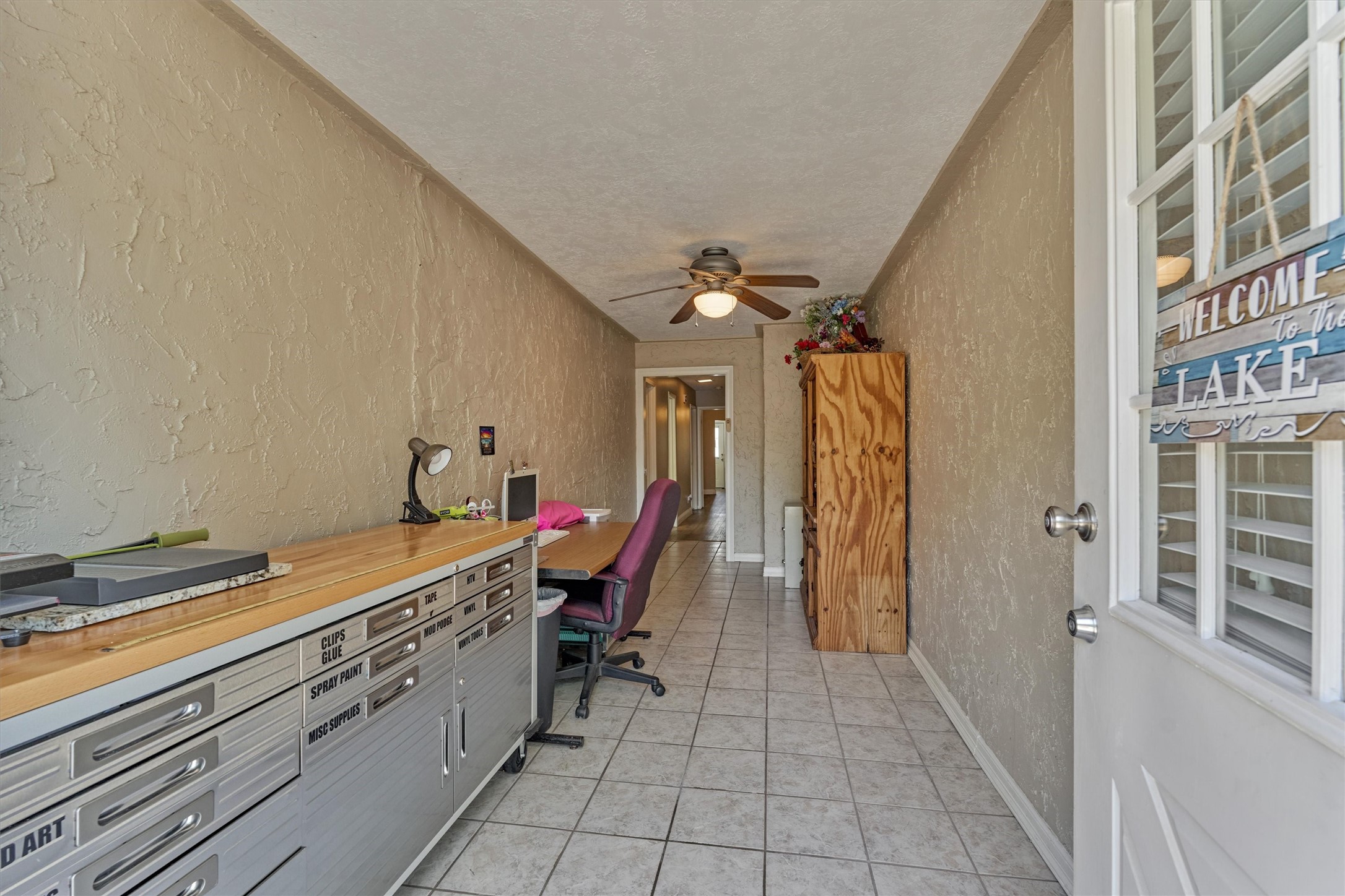 39 Regency Point Conroe, TX 77356 - Photo 13 of 44 This room could be used for crafting, remote work, or additional storage space!