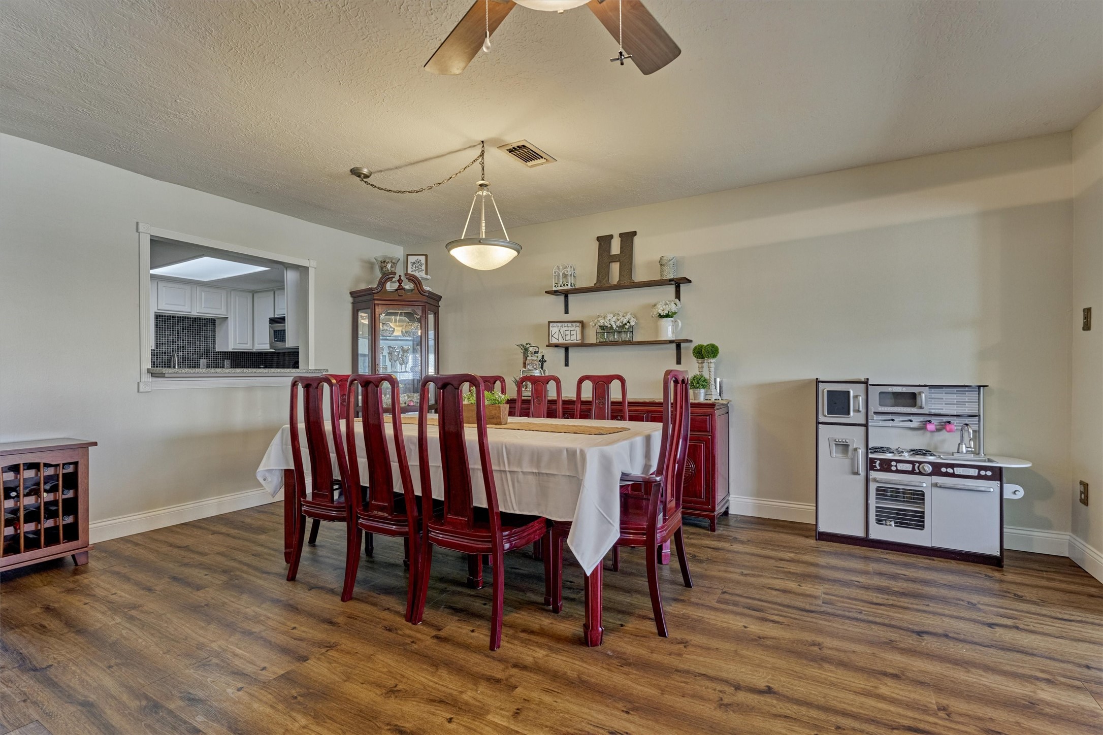 39 Regency Point Conroe, TX 77356 - Photo 15 of 44 a view of a dining room with furniture and wooden floor