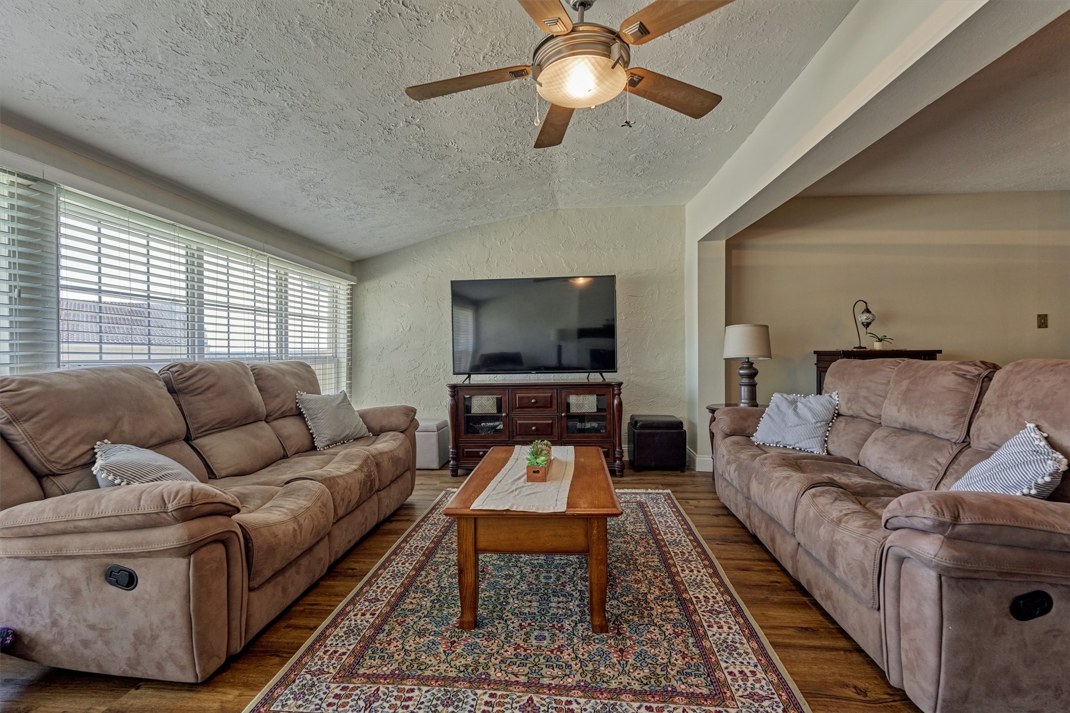 39 Regency Point Conroe, TX 77356 - Photo 18 of 44 a living room with furniture and a flat screen tv