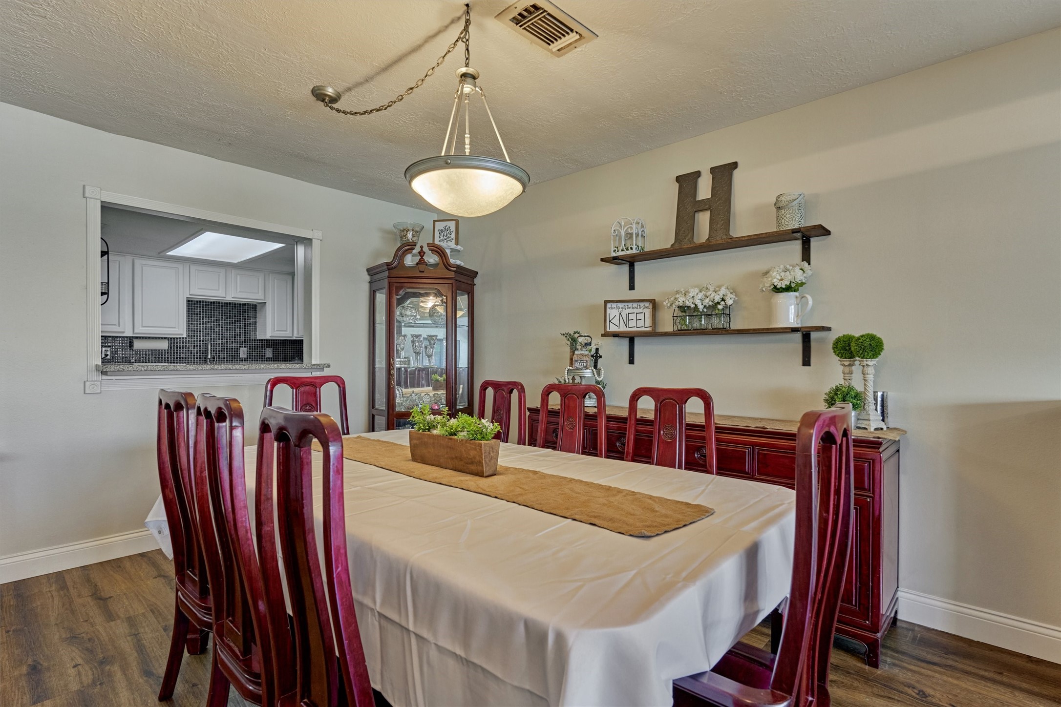 39 Regency Point Conroe, TX 77356 - Photo 21 of 44 a view of a dining room with furniture and wooden floor