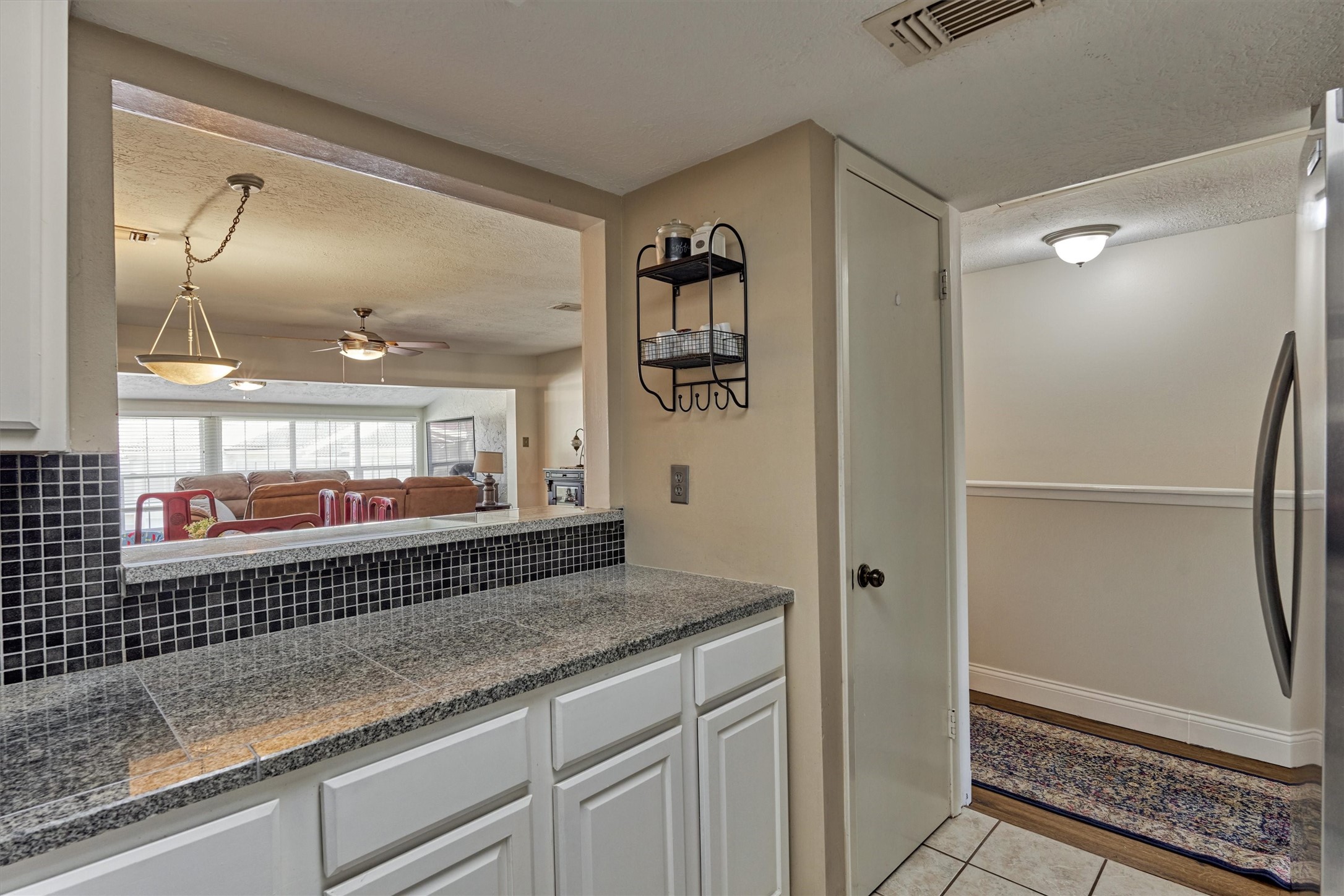 39 Regency Point Conroe, TX 77356 - Photo 24 of 44 This kitchen features tons of countertop space, a pantry, and is open to the other living areas - offering the perfect blend of spaces.