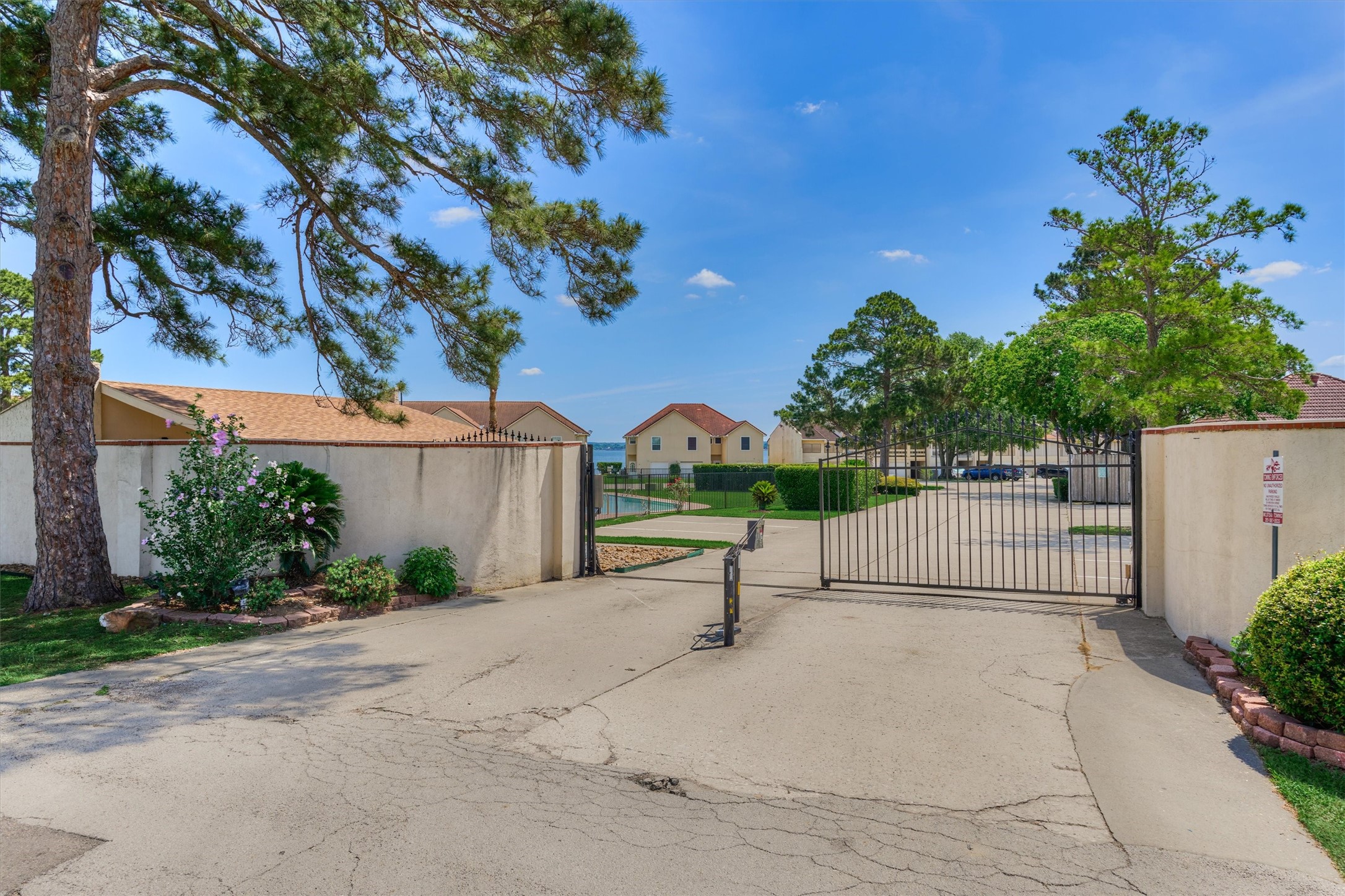 39 Regency Point Conroe, TX 77356 - Photo 32 of 44 a view of a bench in a sidewalk