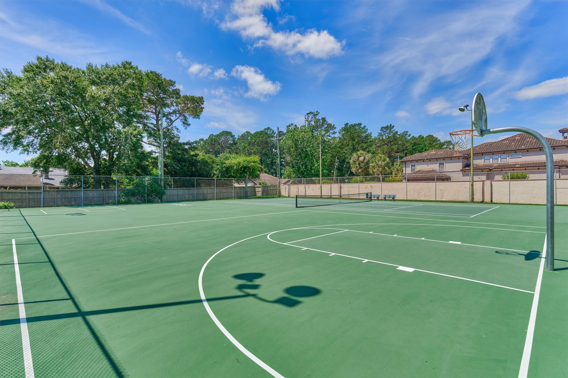 39 Regency Point Conroe, TX 77356 - Photo 36 of 44 A huge sports court for basketball, tennis, and pickle ball!