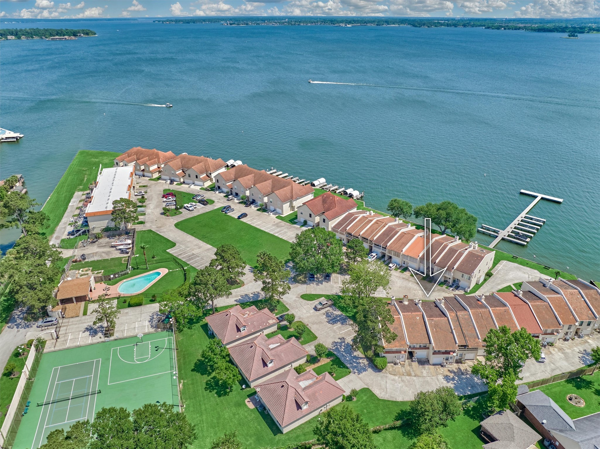 39 Regency Point Conroe, TX 77356 - Photo 38 of 44 Such a special location with panoramic lake views throughout the community.