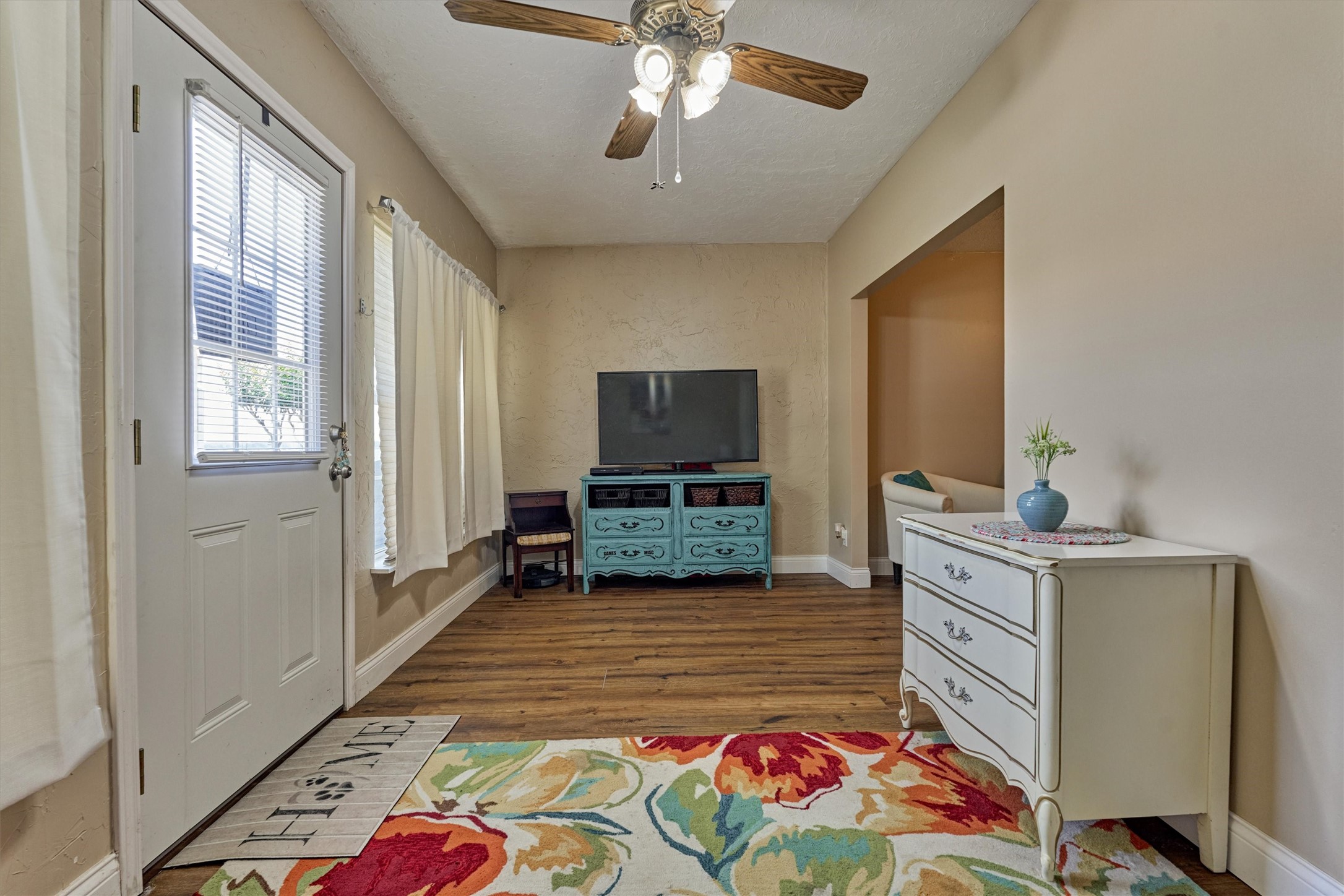 39 Regency Point Conroe, TX 77356 - Photo 8 of 44 a living room with stainless steel appliances furniture and a flat screen tv