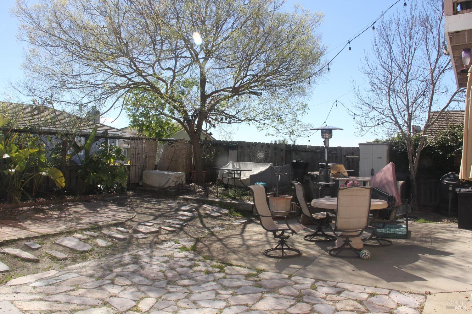 6461 Eagle Ridge Drive Vallejo, CA 94591 - Photo 22 of 22 a view of a tables and chairs in backyard