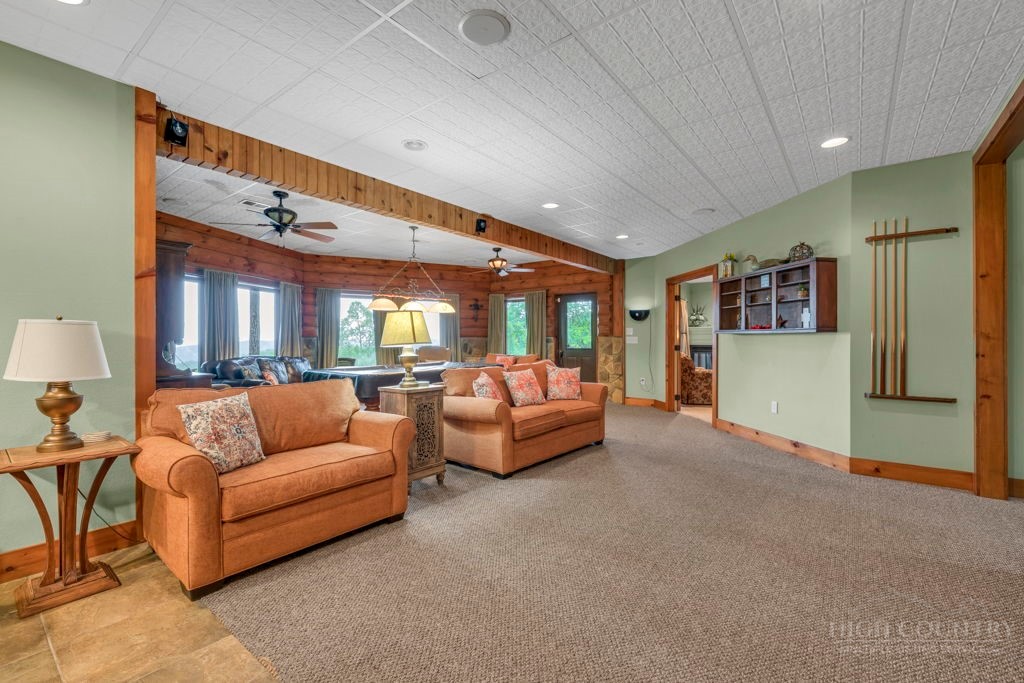 160 Outback Road Ferguson, NC 28624 - Photo 34 of 49 a living room with furniture and a large window