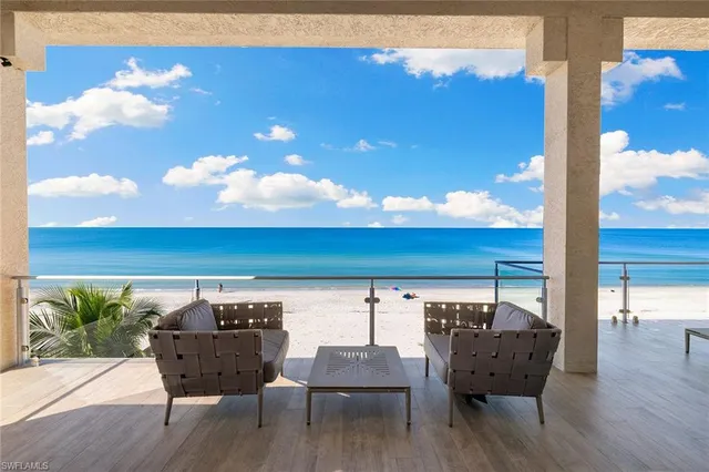 a spacious bathroom with a tub and a sink