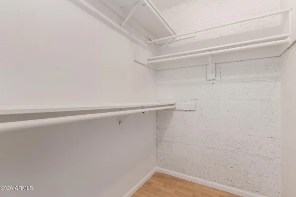 a bathroom with a shower and a toilet