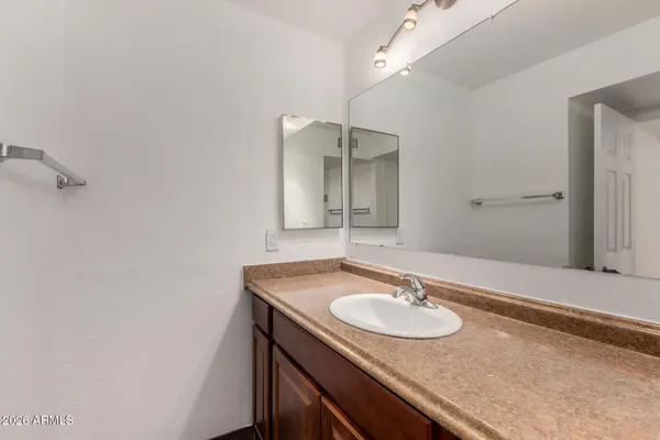 a bathroom with a shower and a toilet