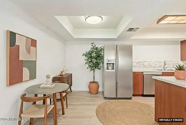 a kitchen with a sink stove and microwave