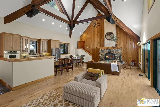 a living room with furniture and a clock