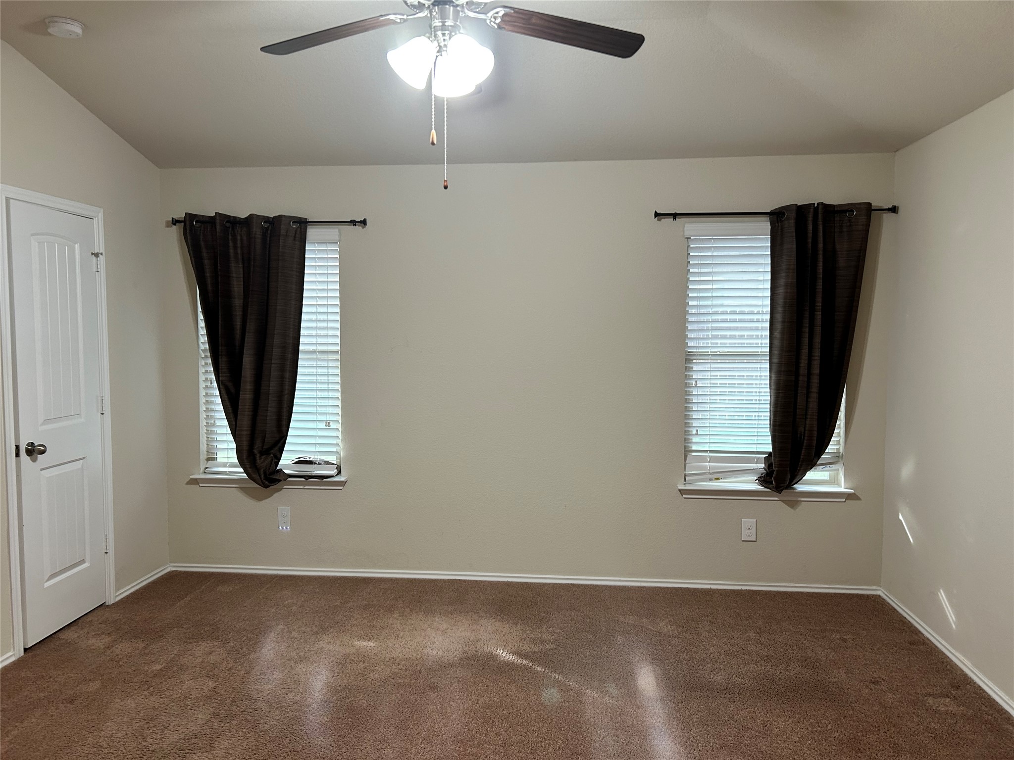 211 Animas Drive Georgetown, TX 78626 - Photo 15 of 25 en empty room with window and hardwood floor