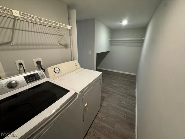 a utility room with washer and dryer