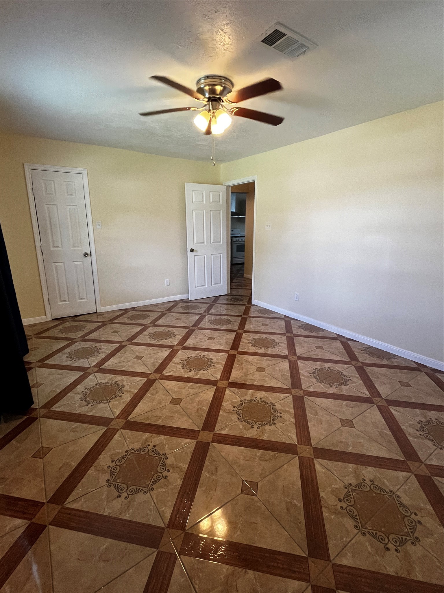 3163 Roe Drive Houston, TX 77087 - Photo 44 of 47 a view of a room with a ceiling fan