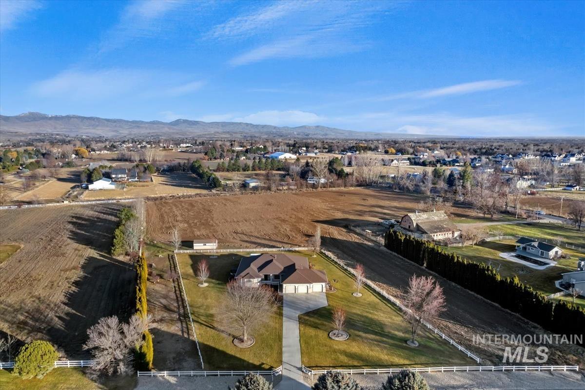 3366 North Croft Way Eagle, ID 83616 - Photo 2 of 33 Overview of rural landscape featuring a mountainous background