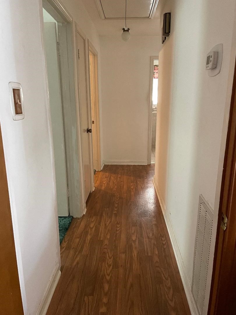 1733 Brumbelow Street Rosenberg, TX 77471 - Photo 13 of 36 a view of hallway with wooden floor