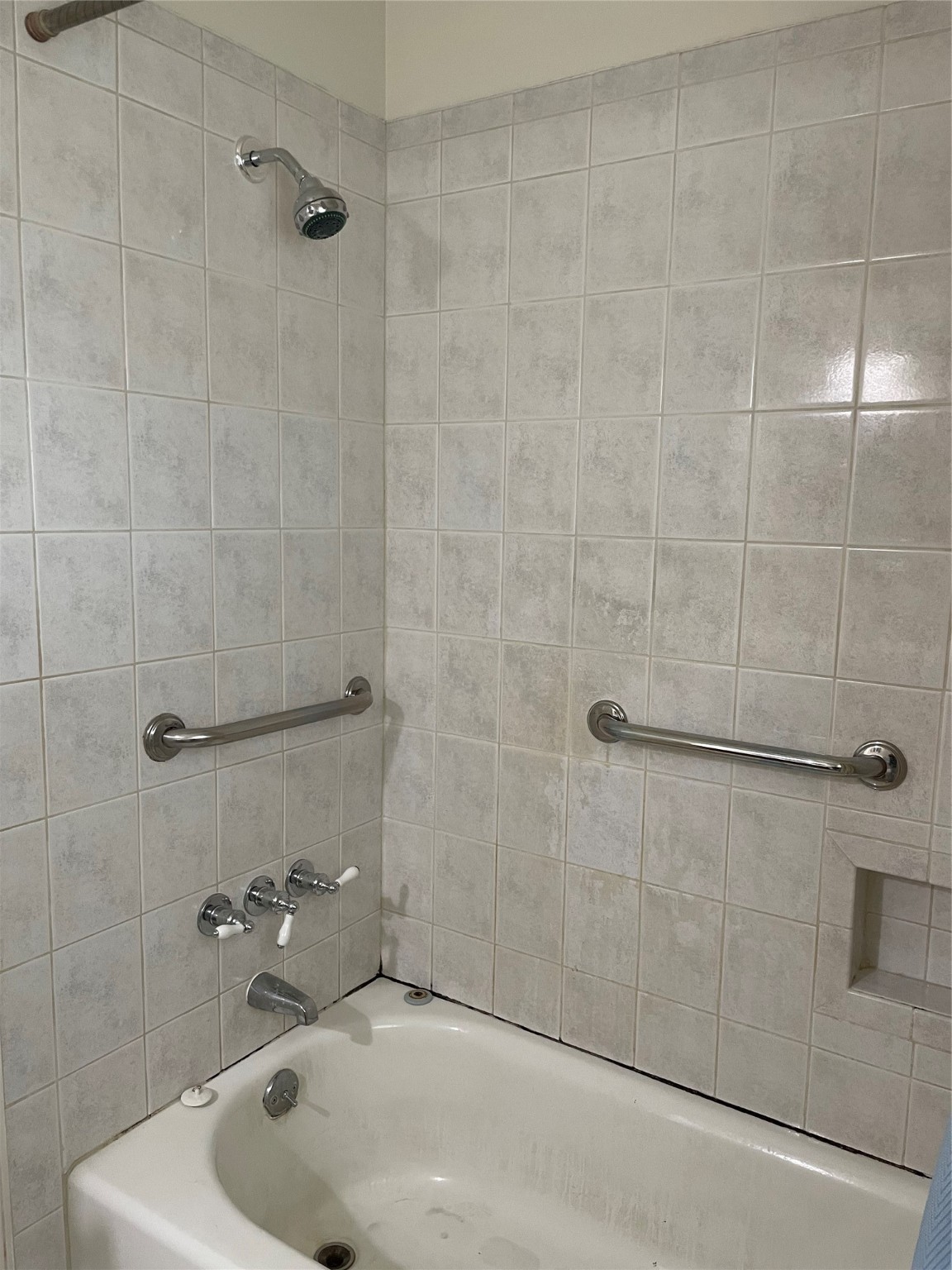 1733 Brumbelow Street Rosenberg, TX 77471 - Photo 18 of 36 a bathroom with a tub and a shower