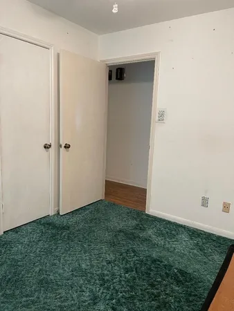 an empty room with window