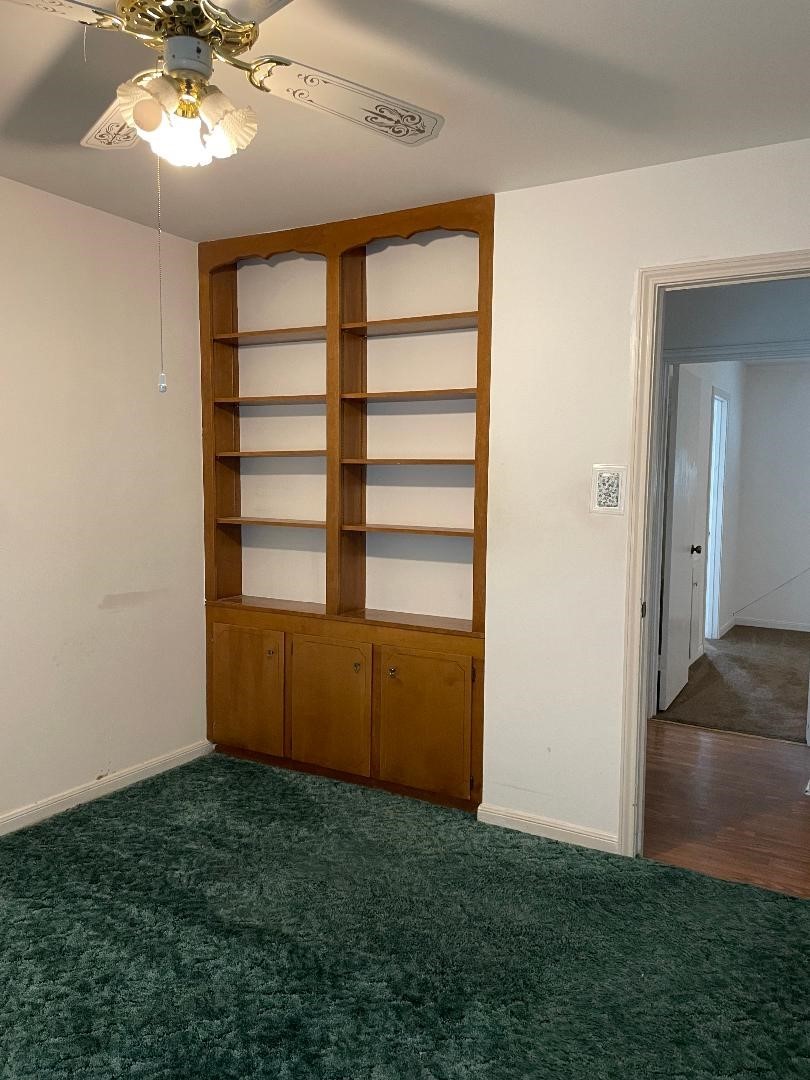 1733 Brumbelow Street Rosenberg, TX 77471 - Photo 21 of 36 a view of room with workspace and a window