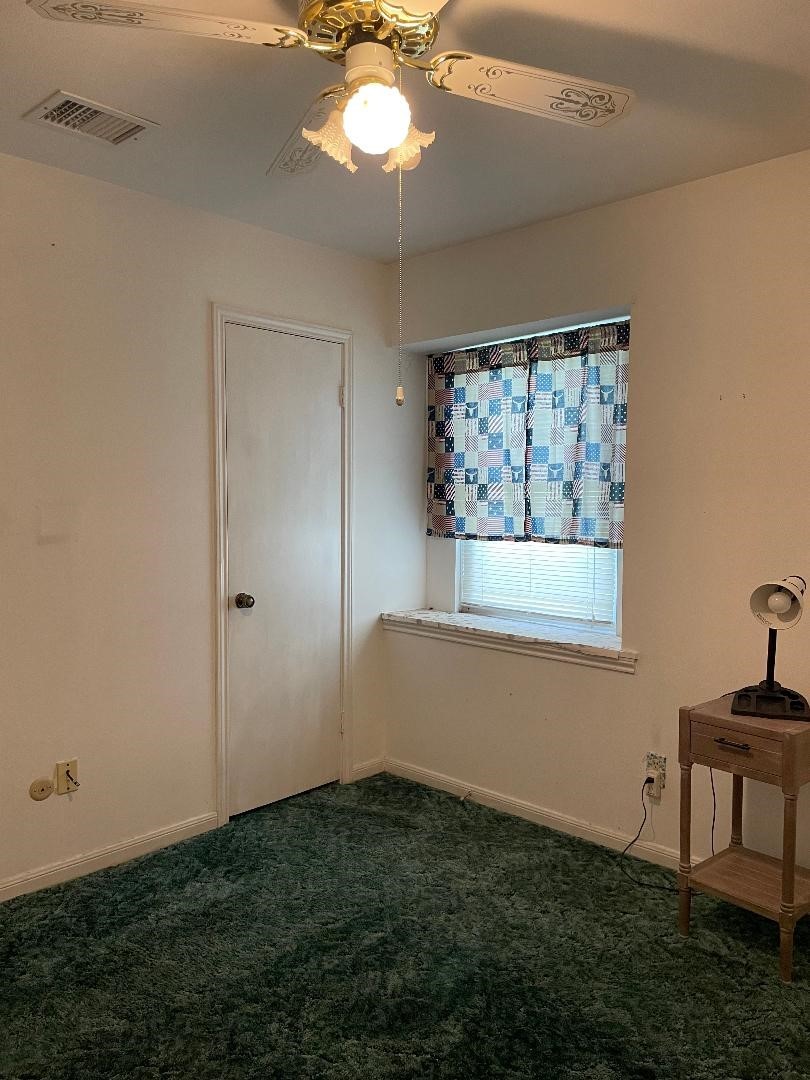 1733 Brumbelow Street Rosenberg, TX 77471 - Photo 23 of 36 a view of room with window and ceiling fan