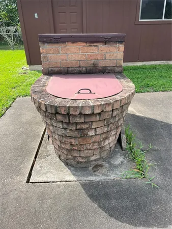 a view of a yard with a tree