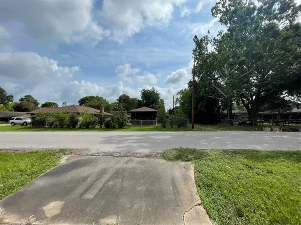 a house view with a backyard space