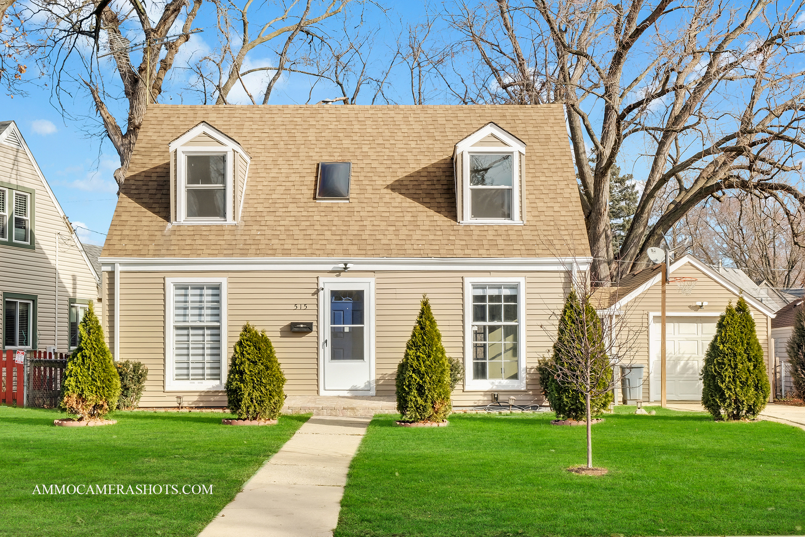 515 Miller Drive Elgin, IL 60123 - Photo 1 of 27 a front view of a house with a yard
