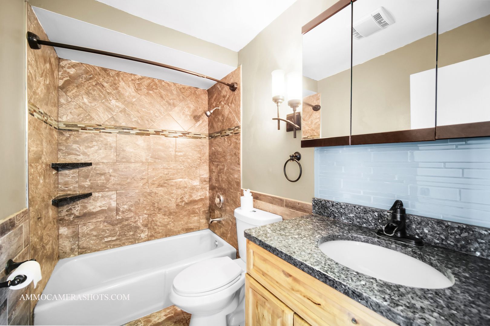 515 Miller Drive Elgin, IL 60123 - Photo 12 of 27 a bathroom with a granite countertop sink a toilet and bathtub