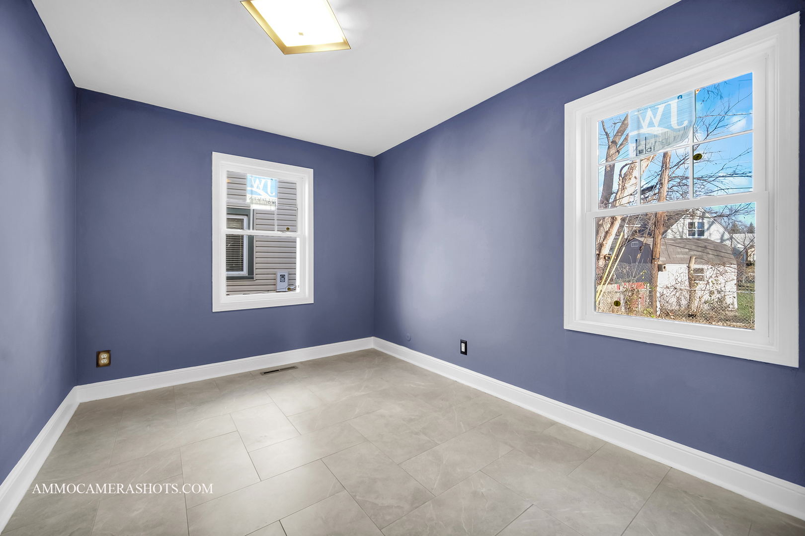 515 Miller Drive Elgin, IL 60123 - Photo 13 of 27 a view of an empty room with windows