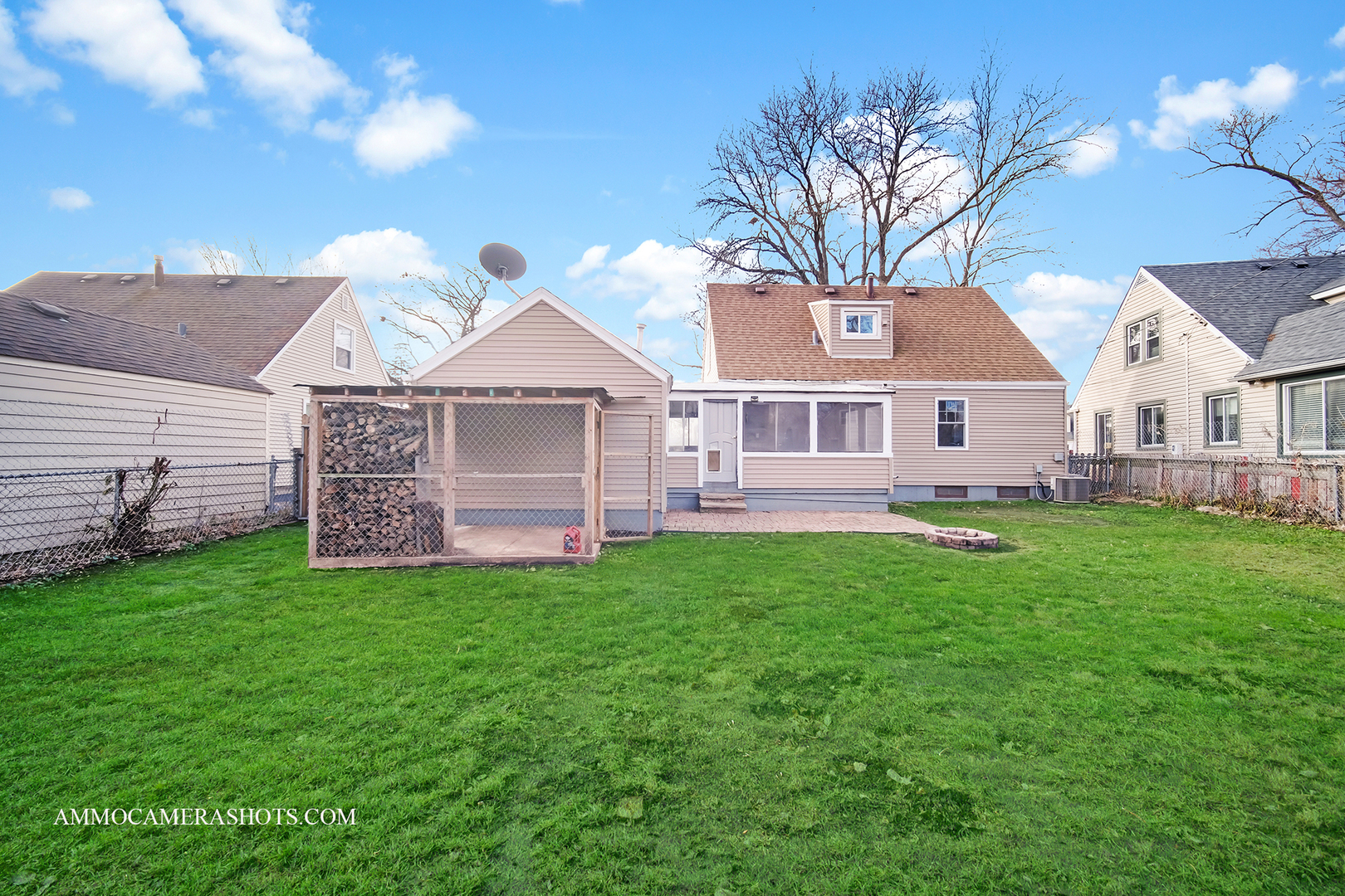 515 Miller Drive Elgin, IL 60123 - Photo 26 of 27 a front view of a house with a garden