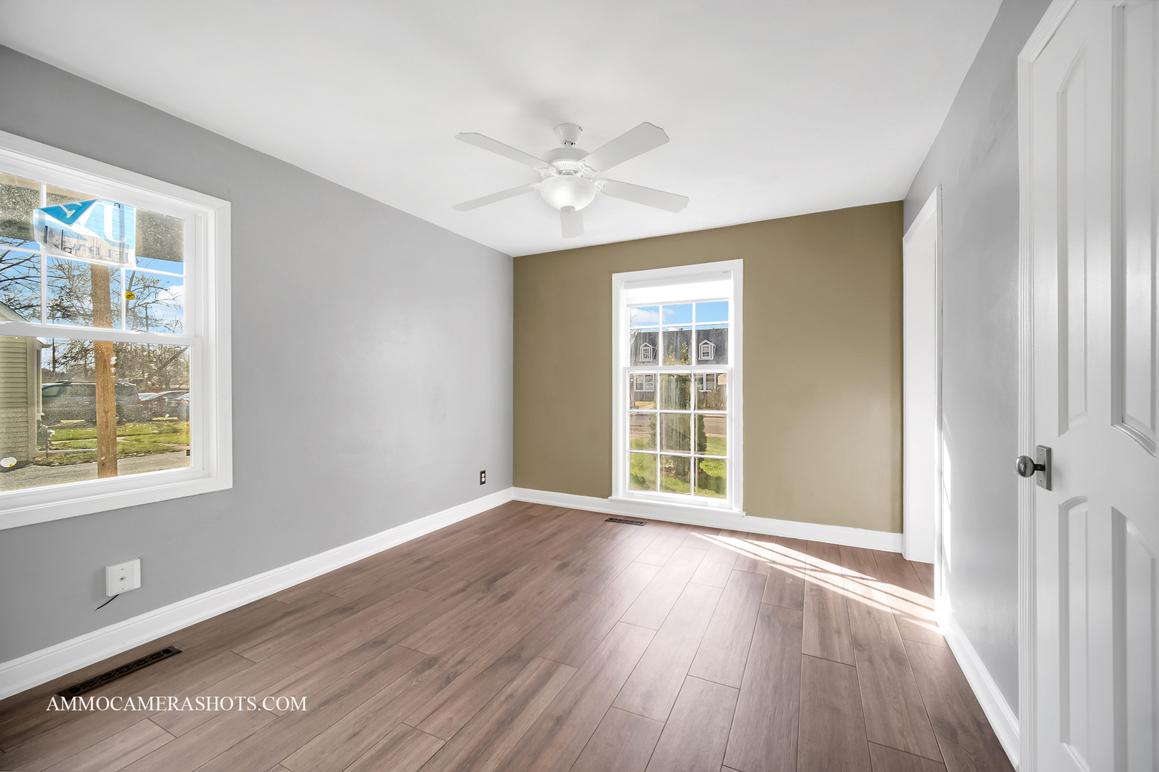 515 Miller Drive Elgin, IL 60123 - Photo 7 of 27 wooden floor in an empty room with a window