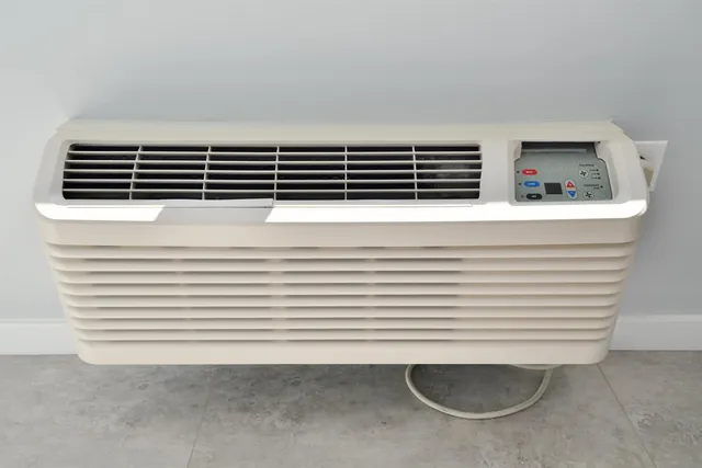 a view of a utility room with washing machine and a sink