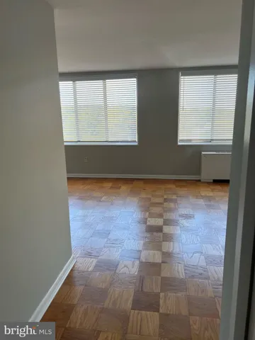 a view of a hallway view with staircase